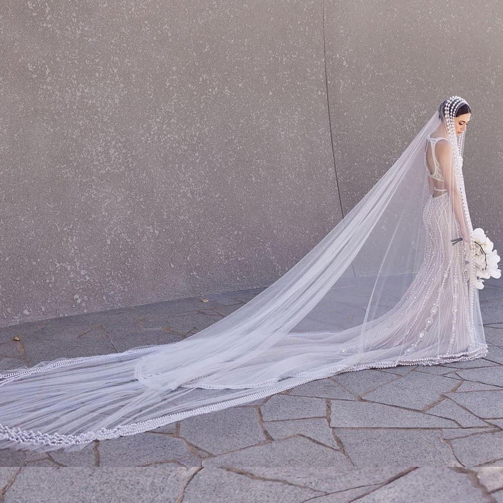 Trailing yarn wedding bridal veil